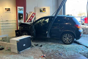 'Like An Earthquake': Video Shows Car Slamming Into Burlington Eye Care Store