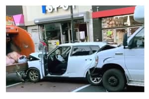 SUV Gets Sandwiched Between Dump Truck, Jitney Bus On Bergenline