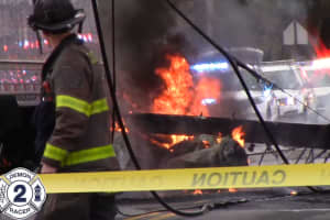 VIDEO: Two Injured, Thousands Lose Power When UPS Truck Topples Pole, Ignites Fire In Clifton
