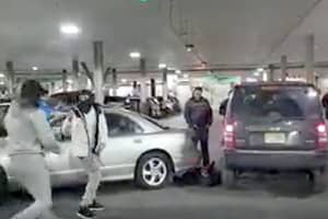 VIDEO: NJ Mall Brawl Erupts When Male Motorist Knocks Female Driver Out Cold