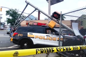 Paterson Police Cars Collide, Topple Traffic Light