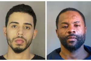 Duo Nabbed With Loaded Handguns Attack Officer Following Single-Vehicle LI Crash, Police Say