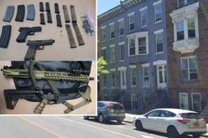 Guns, Ammo Found After Man Shoots Through Neighbor's Ceiling In Capital District, Police Say