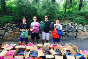 Kids Donate Backpacks To Needly Children In Jamaica