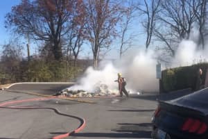 Massive Pile Of Trash Dumped In Parking Lot Goes Up In Flames, Closes Down Maryland Roadway