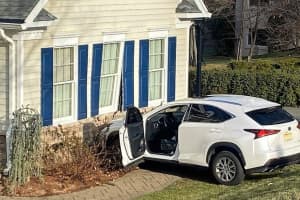 SUV Rolls Into Woodcliff Lake Home