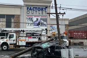 Driver Escapes Injury As Jeep Splits Pole In North Jersey