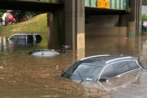 FLASH FLOOD: Motorists Rescued, Vehicles Float, Roads Jammed Throughout Area
