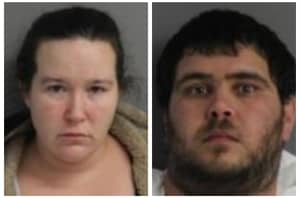 Man, Woman Charged For Double Homicide At Home In Area