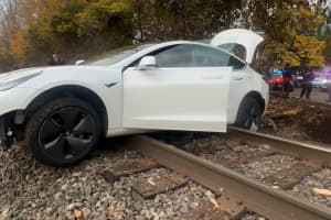 Family Tesla Gets Stranded On RR Tracks, Train Service Suspended On Pascack Valley Line