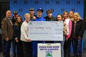 Lowell Police Gift $5,000 Check To Retired Officer's Son Battling Cancer