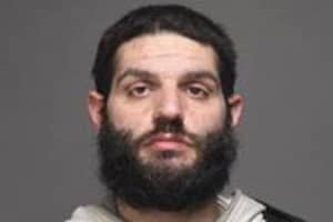 CT Man Found High Dancing In Middle Of Roadway With Tree Branch, Police Say