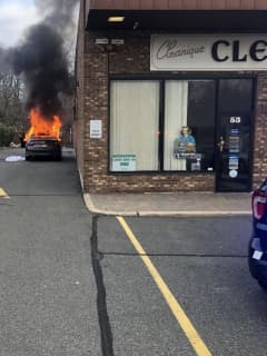 Car Bursts Into Flames At Area Shopping Center, Damages One Business