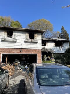 Woman Rescued After House Fire Breaks Out On Long Island