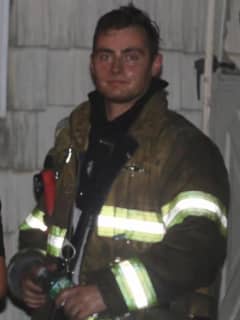 Off-Duty Long Island Firefighter Pulls Man From Burning Car