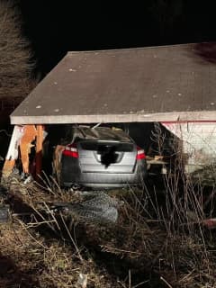 Man Suffering Medical Emergency Crashes Into Garage In Area