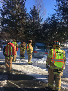 Driver Taken To Hospital After Car Ends Up In Snowbank In Weston