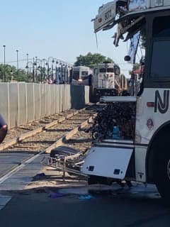 PHOTOS: No Serious Injuries After Commuter Train Whacks Bus In Garfield