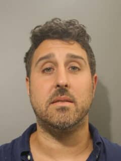 Man Who Posed As Boston Bruins Owner Arrested In Dutchess, Police Say