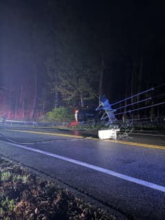 Car Rolls Over, Knocks Down Pole, Wires On Busy Northern Westchester Road