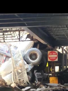 Dump Truck Crashes Through North Bergen Parking Garage