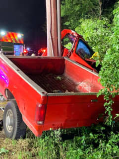 Driver Trapped After Truck Crashes Into Telephone Pole In Trumbull
