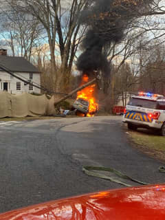 Car Bursts Into Flames After Crashing Into Pole In Westchester