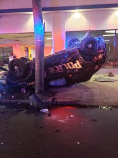 Officers Hospitalized In Jersey City Police Car Rollover Crash