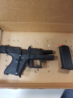 Man Charged After Handgun Found During Traffic Stop On Long Island, Police Say