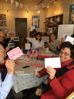 New Rochelle Bookstore Owner Draws A Crowd For Ides Of Trump Postcard Party