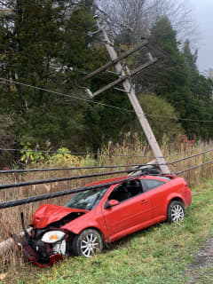 Woman Pinned Under Live Power Lines Following Crash Into Utility Pole In Area