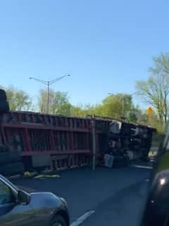 Overturned Tractor-Trailer Carrying Mulch Shuts Route 80 Exit Ramp In Paterson