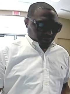 Man Wanted For Making Unauthorized Withdrawals From Suffolk Bank