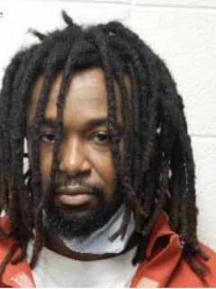 Parole Jumper Nabbed With Assault Rifle, Semi-Automatic Pistol, Police Say
