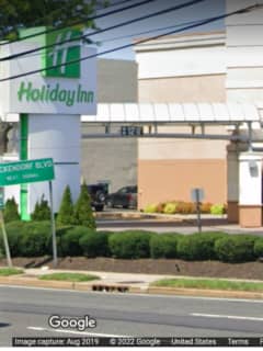 Officer Hospitalized After Woman Becomes Combative At LI Hotel, Police Say