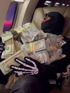 'Playing With Fire': Rapper 6ix9ine Flexes $1 Million In Cash Ahead Of Morristown Arrival
