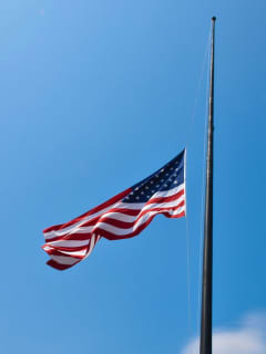 US Flags Flying At Half-Staff In Recognition Of 500,000 COVID-19 Deaths