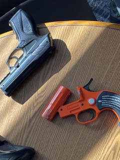 Guns Found In 2 Smart's Mill Middle Schoolers' Belongings: Cops