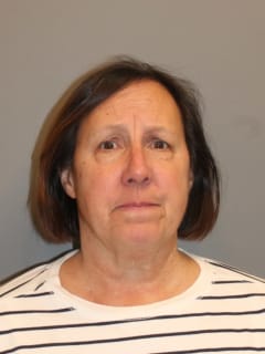 Norwalk Official Charged With Murder After Man Found Dead In Home She Owns