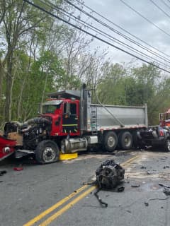 Several Roads Closed Following Crash Between Car, Dump Truck In Area