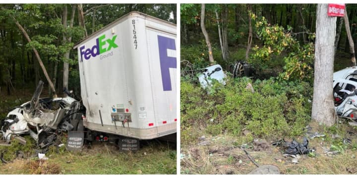 A driver of a tractor-trailer managed to escape life-threatening injuries during a crash that destroyed the truck.