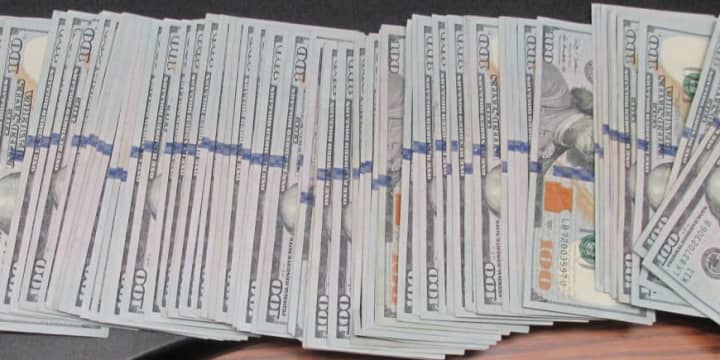 Police have asked the public for information after a 75-year-old man sent more than $8,000 in cash to a Long Island home because he was targeted by scammers.