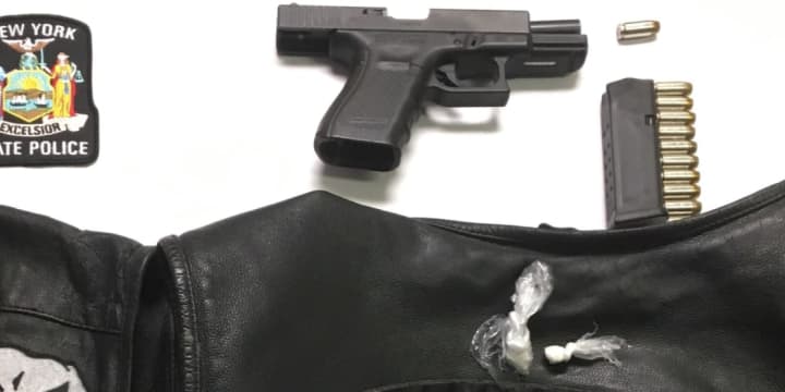 The semiautomatic pistol and cocaine seized by police during the stop.