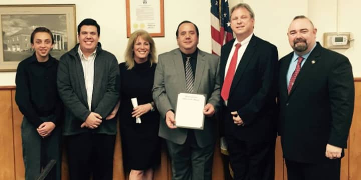 Len Fabiano (center) was honored with a proclamation from Emerson Mayor Lou Lamatina.