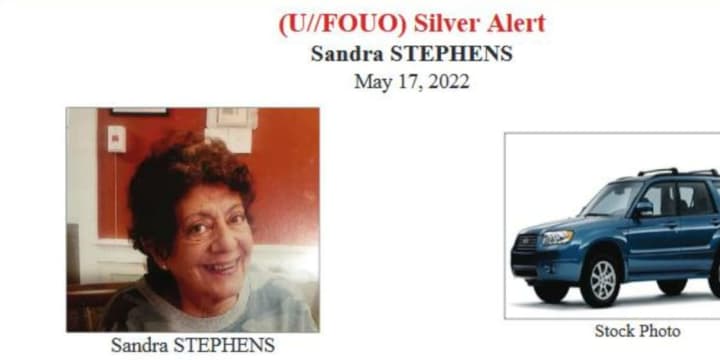 Sandra Stephens and a photo of a blue Subaru Forester