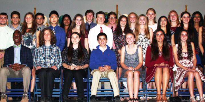 The 28 new members of the Pleasantville High School chapter of the National Honor Society at a recent induction ceremony.