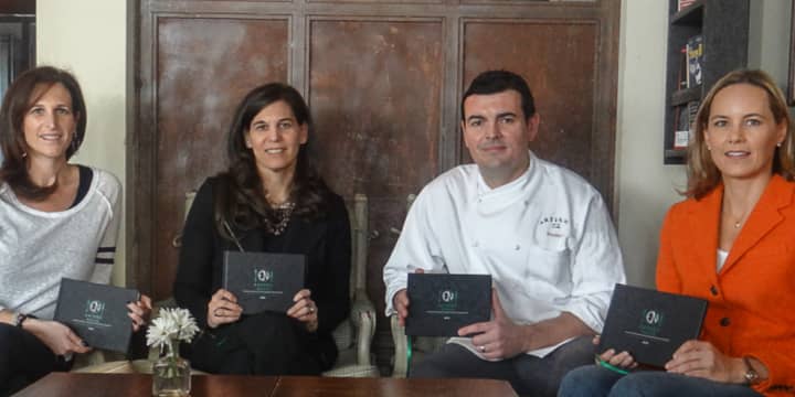 From left, Mica DeSantis, Aline Weiller, Artisan’s Executive Chef Frederic Kieffer and Elizabeth Menke gear up for the launch party for Entrée Nous, LLC and its first restaurant guide (Fairfield County edition).