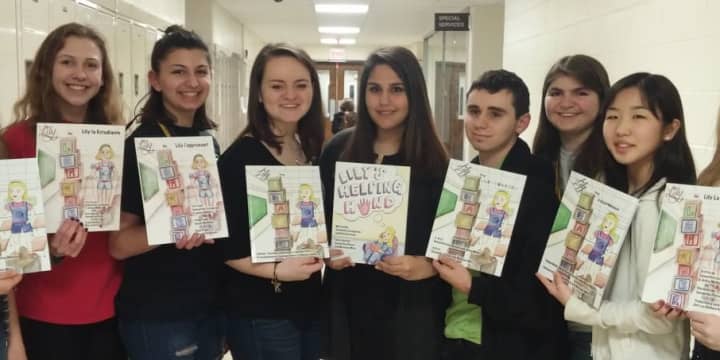 Shannon Stemper, Andie Bigos, Carlie Rein, Kayla Vincent, Nicole Mofrad, Andrew Favorito, Alexandra Capodicasa, Sara Takubo and Marianna Maltsev display their children&#x27;s book &quot;Lily the Learner&quot;