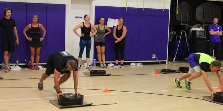 Participants compete in the #plate #plank event at last year&#x27;s Y Games