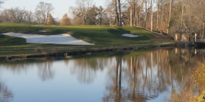 A golf club worker was hospitalized on Sunday after his utility cart rolled over at The Apawamis Club, according to Rye police.
